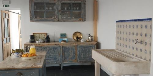 Η κουζίνα ή μικρή κουζίνα στο Casa de Arcos