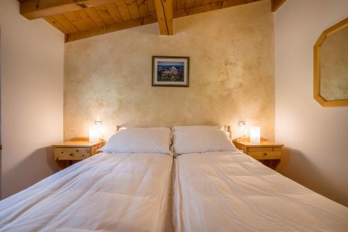 Katil atau katil-katil dalam bilik di Agriturismo Val d' Egoi 2