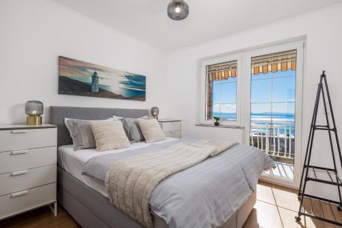 Ένα ή περισσότερα κρεβάτια σε δωμάτιο στο Apartment Ida with terrace, sea view, near Opatija