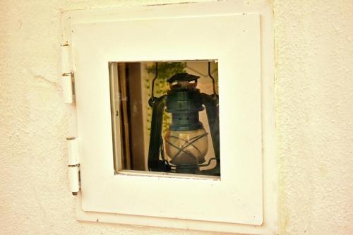 eine Person, die ein Bild in einem Spiegel macht in der Unterkunft La Chicca di Ste in Gallipoli