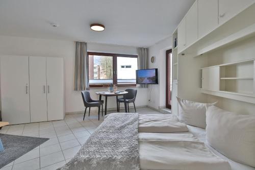 Postel nebo postele na pokoji v ubytování Strandburg Strandburg Appartement 1