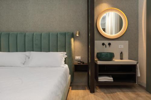 Ένα ή περισσότερα κρεβάτια σε δωμάτιο στο Hotel Sole