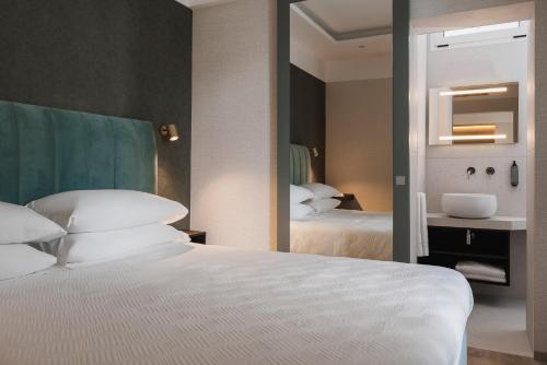 Ένα ή περισσότερα κρεβάτια σε δωμάτιο στο Hotel Sole