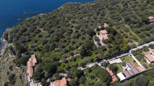 an aerial view of a mountain with houses on it at B&B La Manica in Milazzo