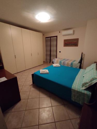 a bedroom with a large bed in a room at B&B La Poiana in Urbino