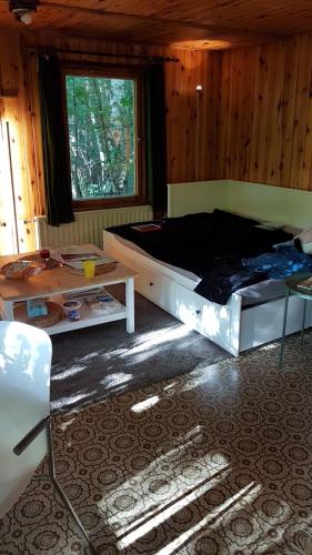 Ένα ή περισσότερα κρεβάτια σε δωμάτιο στο Waldhaus Wiesengrund