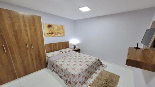 Ένα ή περισσότερα κρεβάτια σε δωμάτιο στο Hotel Residencial Manaus - Flores