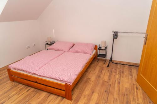 Ένα ή περισσότερα κρεβάτια σε δωμάτιο στο Apartmán Tereza