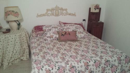 Кровать или кровати в номере Casa Mariuccia
