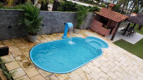 Swimmingpoolen hos eller tæt på EnseadaPrime eventos e casamentos beira-mar na Praia Enseada dos Corais PE para 300 Pessoas