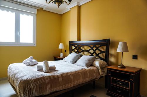 Postel nebo postele na pokoji v ubytování Puertito Attic Apartment