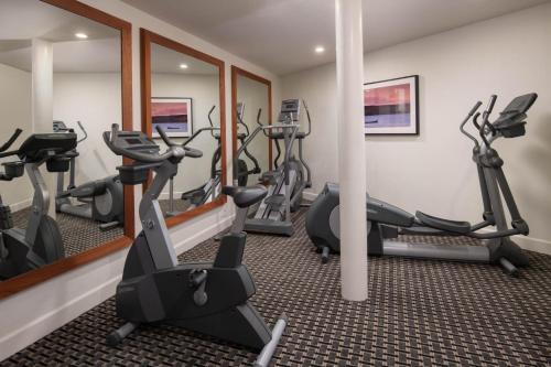 a fitness room with treadmills and elliptical machines at The Lodge at Tiburon in Tiburon