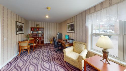Ruang duduk di Smart Suites, an Ascend Collection Hotel