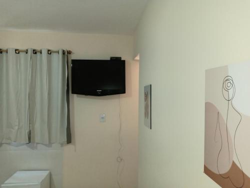 TV i/ili multimedijalni sistem u objektu Apartamento Mtz