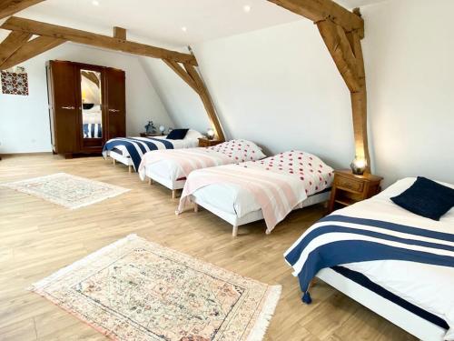 Ένα ή περισσότερα κρεβάτια σε δωμάτιο στο Le Familik- Maison- CentreVille