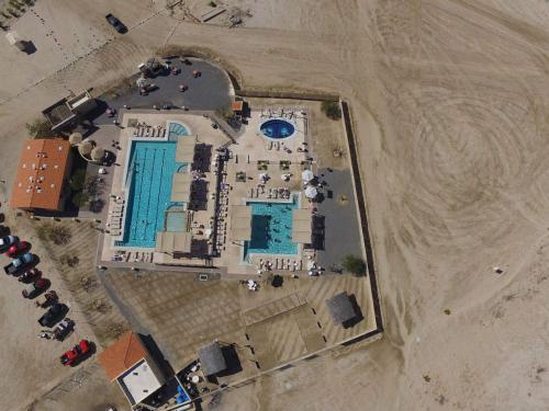 an aerial view of a building with a swimming pool at El Dorado Ranch San Felipe Rental - Judy`s Casita in Playa El Paraíso