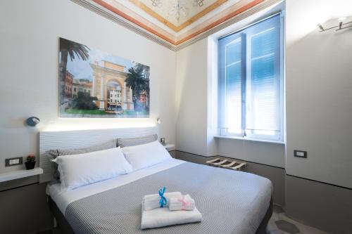 Кровать или кровати в номере FINARIN Guest House