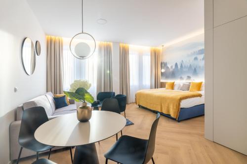 Postel nebo postele na pokoji v ubytování Resort Český les