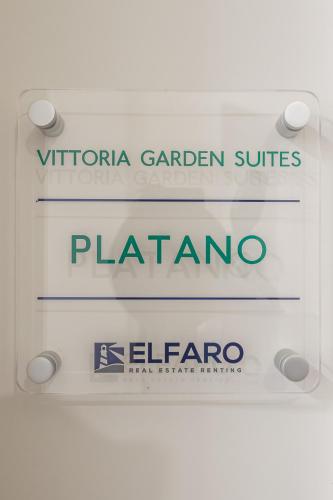 a sign for a pharmacy with the words platino at Vittoria Garden Suites in Rome