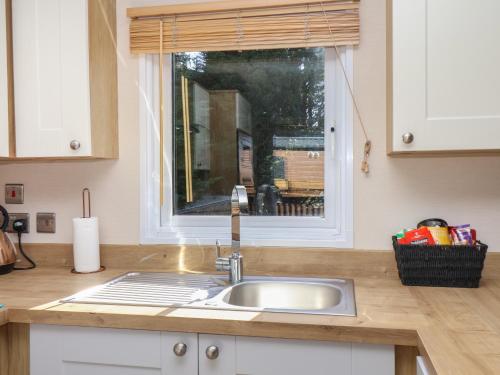 Η κουζίνα ή μικρή κουζίνα στο Tulip Lodge