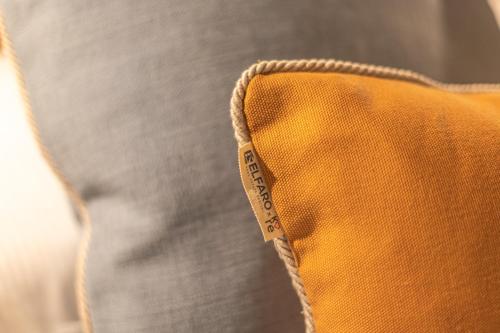 a close up of an orange bag with a zipper at Vittoria Garden Suites in Rome
