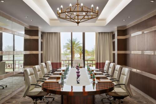 a large conference room with a long table and chairs at InterContinental Durrat Al Riyadh Resort & Spa by IHG in Riyadh
