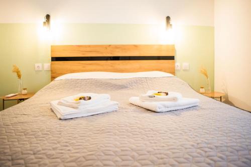 Letto o letti in una camera di Central Maisonette