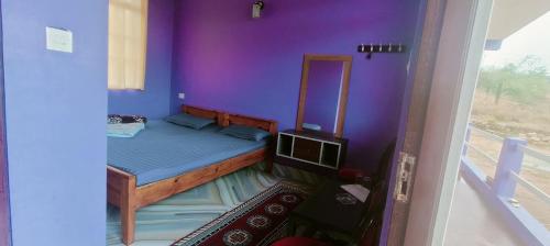 Ένα ή περισσότερα κρεβάτια σε δωμάτιο στο Lavender Guesthouse