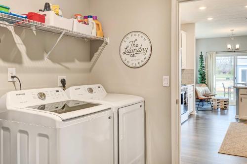 a laundry room with a washer and dryer at Spacious Home with Patio Near Fishers! in Fishers