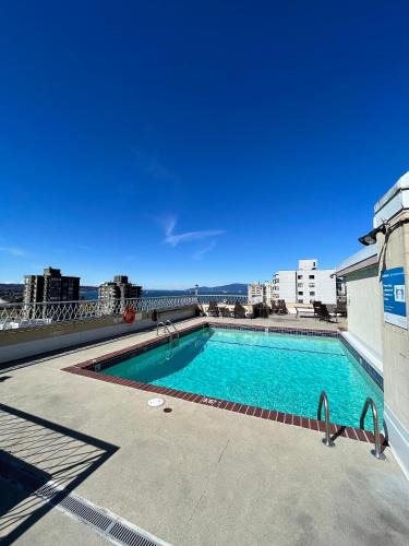 a swimming pool on the roof of a building at Ocean view in Vancouver