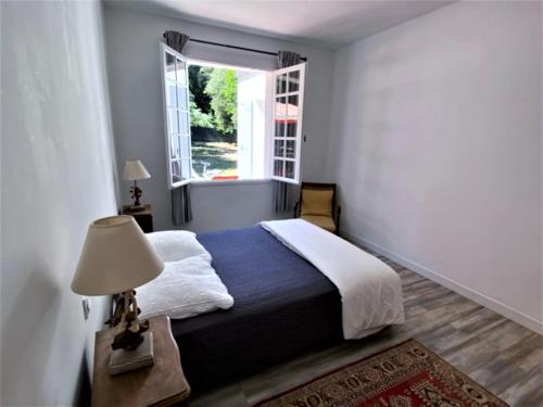 Postel nebo postele na pokoji v ubytování La Haute Foret proche mer