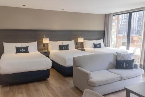 Una cama o camas en una habitación de Wyndham Garden Guatemala City