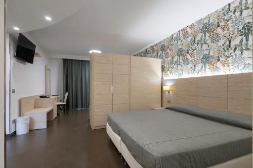 Posteľ alebo postele v izbe v ubytovaní Alaba Hotel