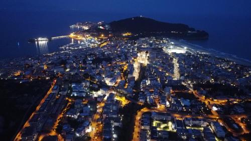 an aerial view of a city at night at The Sorabellas in Gaeta