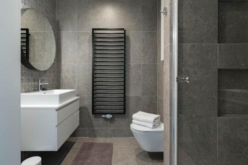 Et badeværelse på INA Rent - Riverview