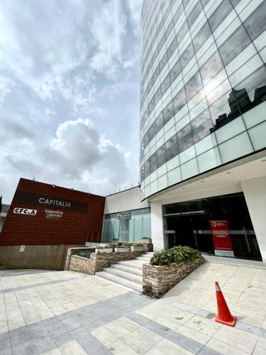 a building with an orange cone in front of it at Loft en Avenida Santander, Vista a las montañas in Manizales