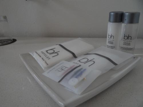 two products on a plate on a counter at Hotel bh Parque 93 in Bogotá
