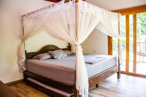 Ένα ή περισσότερα κρεβάτια σε δωμάτιο στο Hermosa CasaQuinta Con Piscina Privada.