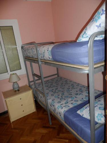 Krevet ili kreveti na sprat u jedinici u okviru objekta Cheap Booking Rooms