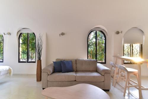 Χώρος καθιστικού στο Aldea Bella Boutique