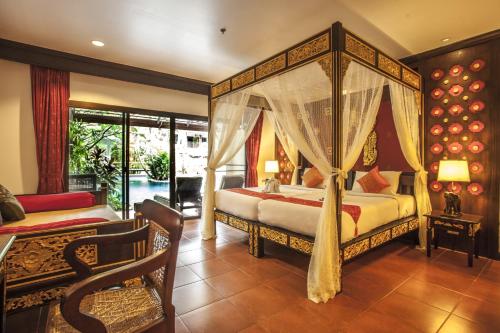 Letto o letti in una camera di Kata Palm Resort - SHA Plus