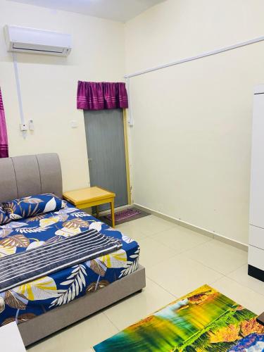 Ένα ή περισσότερα κρεβάτια σε δωμάτιο στο Homestay Zalida D Musleem