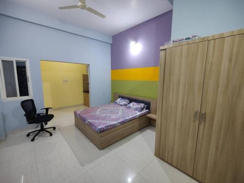 A bed or beds in a room at JAGDEESH Bhawan