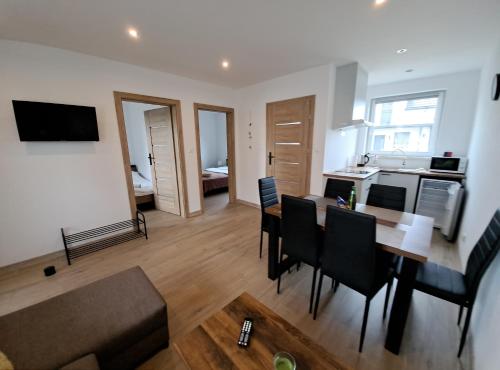 Kuchyň nebo kuchyňský kout v ubytování Apartamenty Bursztynowa Zatoka - Łeba - Nowęcin