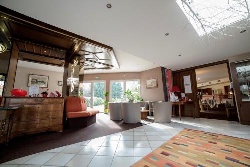 Ruang duduk di Hotel Restaurant Le Coquelicot