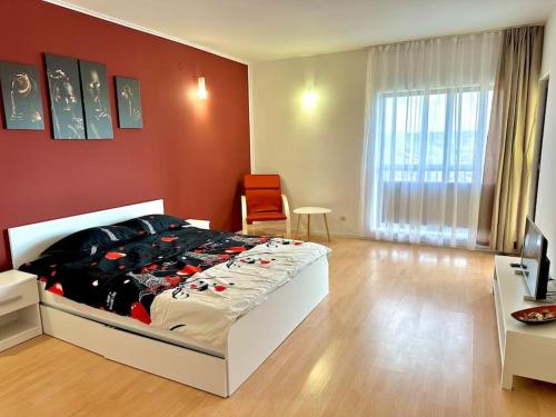 Posteľ alebo postele v izbe v ubytovaní Apartament Novara 2