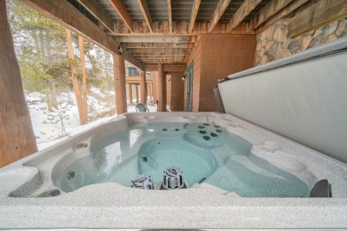 a jacuzzi tub in the middle of a house at Starfire 1992 in Keystone