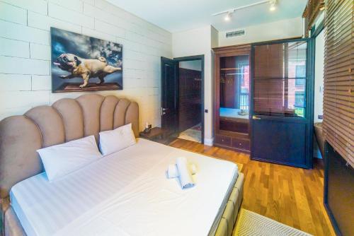 Ένα ή περισσότερα κρεβάτια σε δωμάτιο στο Hotel Manica Esentai City