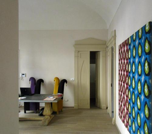 a dining room with a table and chairs at Residenza Dell' Opera in Turin