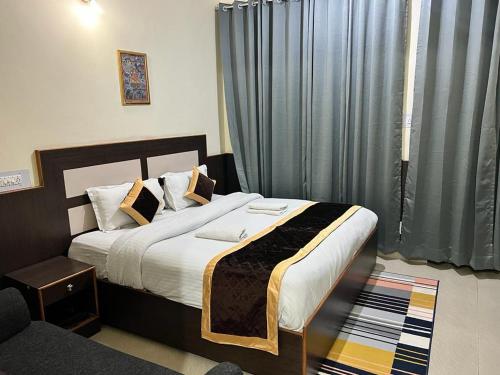 Ein Bett oder Betten in einem Zimmer der Unterkunft Sky Pie hotel